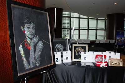Silent auction items included artwork featuring a depiction of Audrey Hepburn.