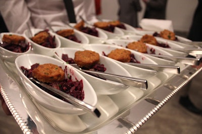 Caterer Bite served rounds of hors d'oeuvres, as well as small plates of more substantial food.