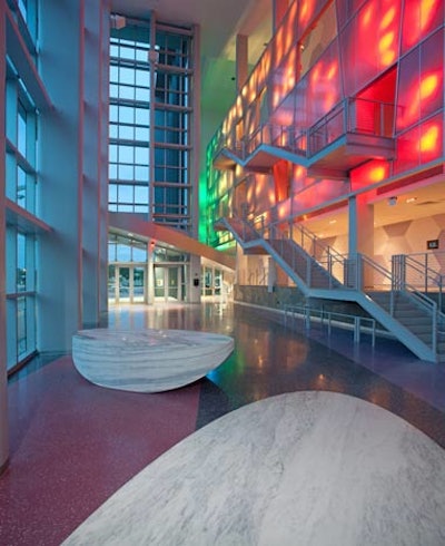 A computer-programmed LED fixture by Miami artist Robert Chambers lights up the lobby area.