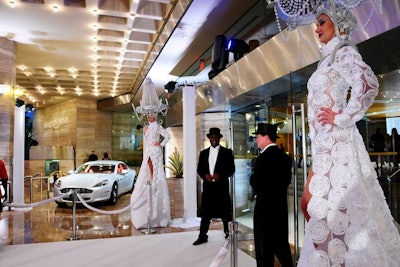Two models dressed as living chandeliers greeted guests at the entrance to the hotel.