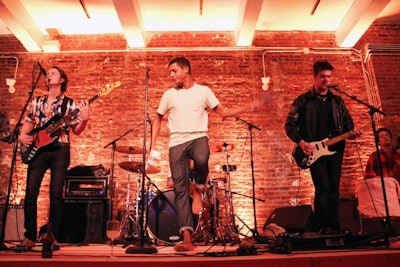 The event's live musical act was the band the Ill Fits, a group fronted by Miles Benjamin Anthony Robinson (pictured, center).