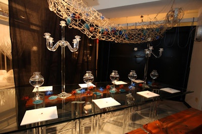 Students from the International Academy of Design and Technology, mentored by fashion designer Alessandra Branca, designed a table with an ocean theme.