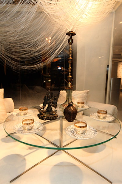 Filled with white pillows and a hookah pipe, the setting from Carnegie, designed by Gensler, resembled a hookah lounge.