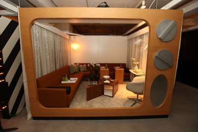 The shape of a vintage TV framed a vignette from Coalesse and Steelcase, designed by Nelson.