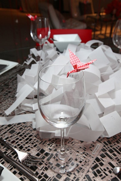 At a table designed by students from the Harrington College of Design with Daniela Ghertovici, miniature origami swans served as drink garnishes.