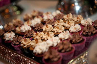 Guests could help themselves to red velvet, dulce de leche, and chocolate cupcakes from We Bake in Heels.