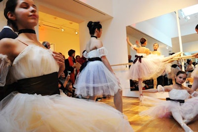 Ballerinas from the Kirov Academy of Ballet of Washington practiced warming up before a rehearsal, just like the dancers in Degas’s paintings in the room next door.