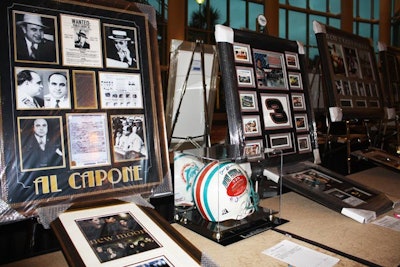 The silent auction included many framed collections of sports and entertainment memorabilia. Clean the World is planning to offer some of the remaining items in an online auction later this month.