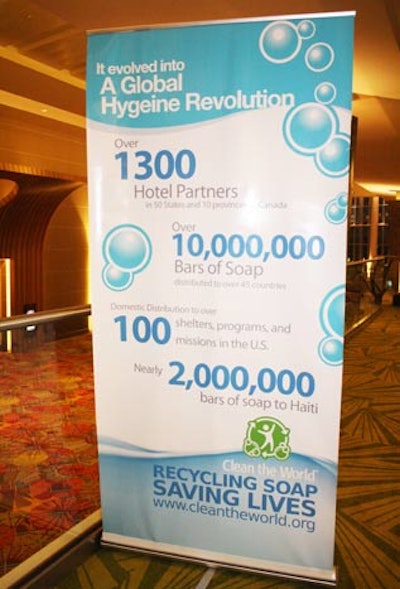 Organizers used large signs lining the walkway to the ballroom to educate guests about Clean the World.