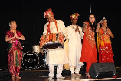 Organizers invited local Dr. Usha Jain to lead a performance representing India.