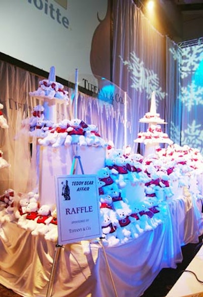 A thousand white teddy bears lined the back of the dining room. Guests could purchase one for a chance to win $35,000 worth of Tiffany jewelry in a raffle.
