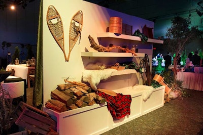 A wall of Canadian cottage items decorated the space near the fake lake.