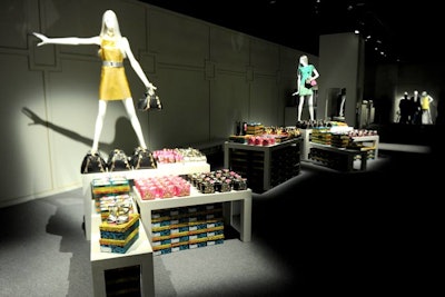 Directly off stage right, the 4,000-square-foot Versace for H&M pop-up shop, which opened just after midnight, was set up as one long hallway, with the women's collection to the right and men's to the left. Fitting rooms were built on the right-hand side in the center of the space, while two rows of registers flanked each end. Much of the collection was purchased almost immediately by attendees, with the shop closing at 3 a.m.