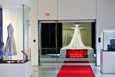 A replica of Grace Kelly's wedding dress is on display in the exhibit.