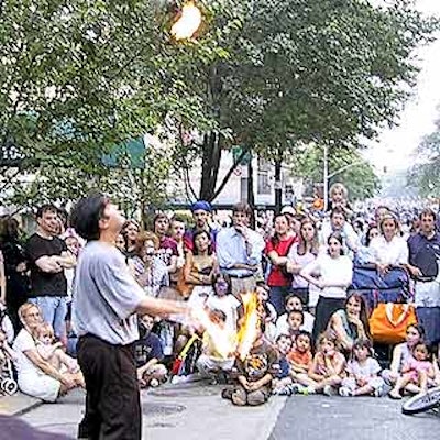 Performer Josh Weiner displayed his fire juggling skills for the crowd.