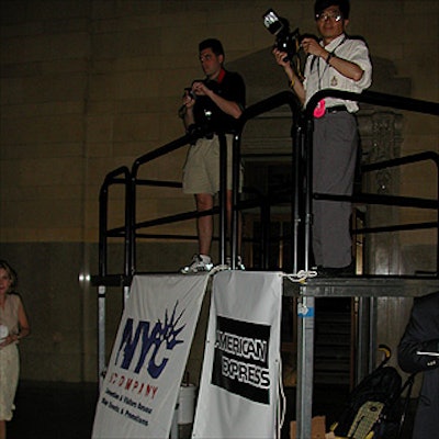 A raised platform from Overland Entertainment helped photographers get overhead shots with a dramatic view of Grand Central Terminal behind the giant slice of cheesecake.