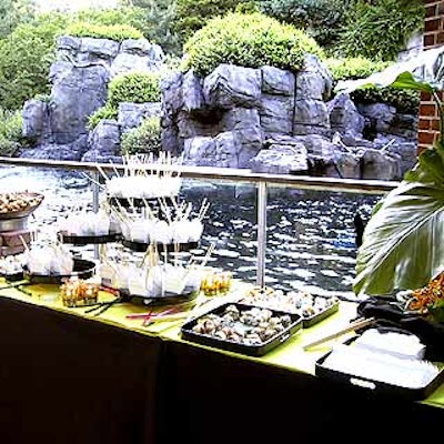 Match Catering and Eventstyles set up several buffet stations, including one offering food in take-out containers with chopsticks.