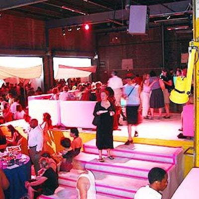 Robert Isabell transformed United Envelope's loading dock area across from the museum into a bilevel lounge. BML Stage Lighting and Productions bathed the space in comforting rosy light.