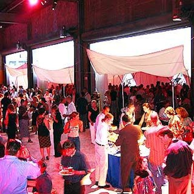 The lower level of the loading dock area had additional food stations that continued within the interconnected tents.