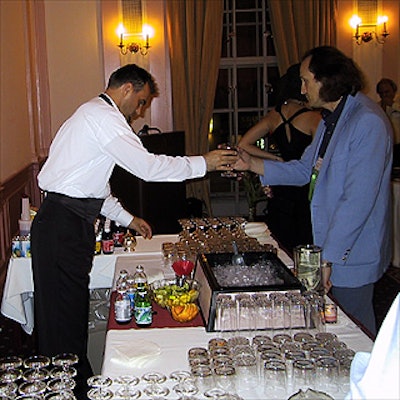 Bartender Dimitre Roussev served drinks from the full bar provided by the SouthGate Tower Suite Hotel.