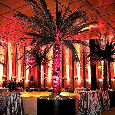 Guests moved into the pool room after the presentation where the restaurant's palm trees and hanging ferns were accented by simple touches.