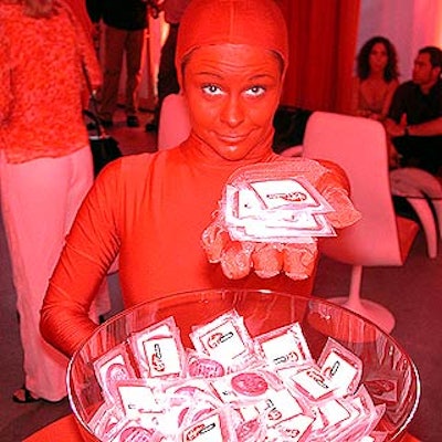 The offbeat entertainment at Virgin Group's launch launch party for its new Virgin Mobile cell phone service included performers passing out Virgin-branded condoms.