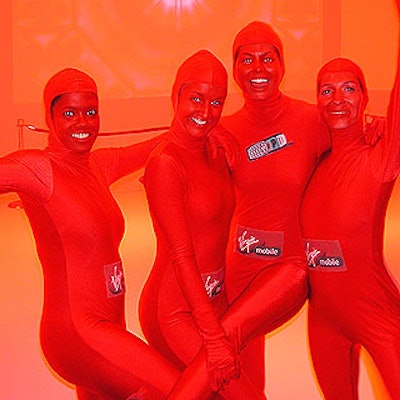 US Concepts coordinated the troupe of performers dressed in red spandex jumpsuits who danced around the crowd.