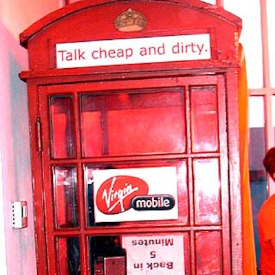 The party's red-crazy branding included an old red telephone booth (a reference to Virgin's English heritage) where guests could chat with drag queen Hedda Lettuce.