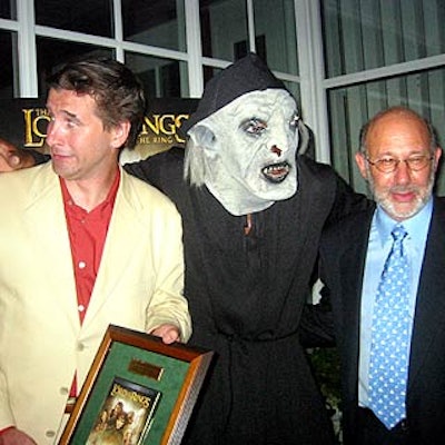 Creative Coalition president William Baldwin posed with a costumed actor and New Line Home Entertainment president Stephen Einhorn at the nonprofit's benefit launch party for the Lord of the Rings: The Fellowship of the Ring DVD.