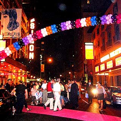 Multicolored balloons made a giant arch across 52nd Street that linked the show's home at the Neil Simon Theatre to the party at Roseland Ballroom.
