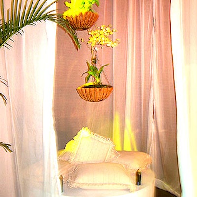 Event producer Frederick Anderson of Anderson Hannant used a white color theme, with white couches and potted palms.