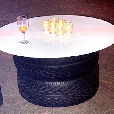 Stacks of tires served as the base for low cocktails tables.