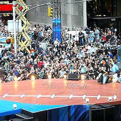 A screaming crowd surrounded Enrique Iglesias as he performed on the large football-shaped stage.