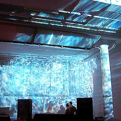 Frost Lighting created a textured lighting effect on the venue's bare white walls.