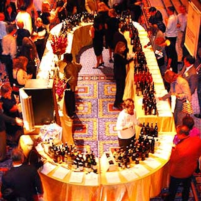 The oval-shaped silent auction table featured dinners at local restaurants and several wine sets and gift baskets.