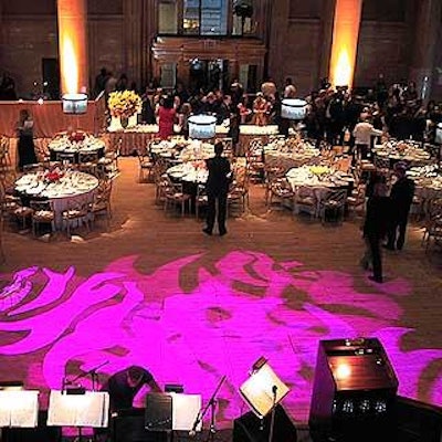 Lighting designer Bentley Meeker used amber spotlights on the ballroom's columns, and vibrant lighting patterns on the dance floor.
