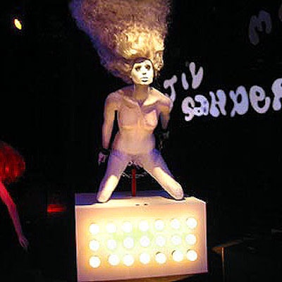 Recreating the Korova Milk Bar from the movie A Clockwork Orange, Jil Sander's store opening party at Pyramid Club was decorated with female mannequins placed in dramatic positions and lit by Levy Lighting.