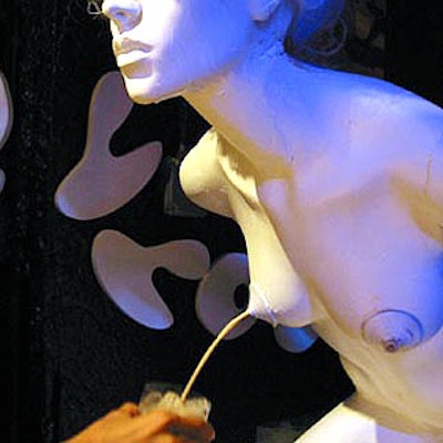 Guests could fill their drink cups with 'breast milk' spewing from a mannequin fountain.