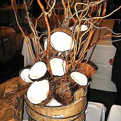Chicama restaurant provided an exotic alternative to flowers by decorating its table with tall curly twigs and a tumbling arrangement of hacked-open coconuts.