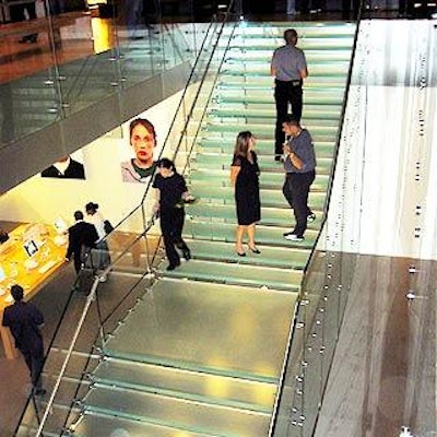 Guests walked the dramatic clear staircase in the middle of the store.