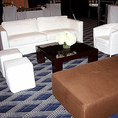 Greenroom brought in modern looking white furniture, including square couches and cube seats, for the show's green room downstairs.