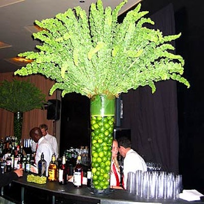 Magnolia Flowers & Events decorated the green room with giant green flower arrangements.