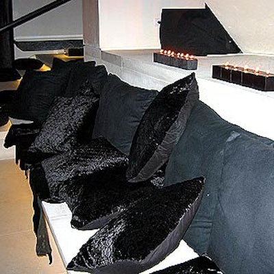 A row of black seats was covered with faux black cashmere and topped black pillows.