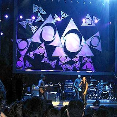 After remarks from AOL Time Warner's top brass, Warner Brothers artist Alanis Morissette performed on a stage designed by Hotopp Designs.