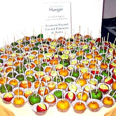 Candied apples donated by Francois Payard of Payard Patisserie & Bistro decorated the entrance to City Harvest's Bid Against Hunger tasting benefit at the Puck Building.