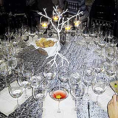 David Tutera decorated a corner of the Props for Today showroom with silver tablecloths and candelabras that looked like white branches for the vodka tasting he led for members of the International Special Event Society's New York metropolitan chapter.