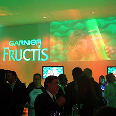 Green light filled the venue's second floor, and Fructis commercials were projected on the walls and on flat-screens.