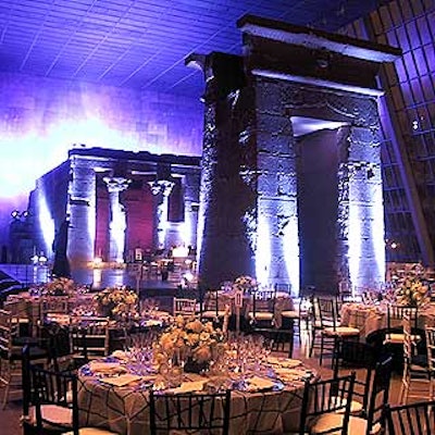 Cotton Inc. served dinner at its annual Celebration of American Style party in the Metropolitan Museum of Art's Temple of Dendur, where Frost Lighting cast midnight blue light over the room.