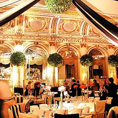 At the Food Allergy Initiative's annual benefit at the Plaza, Antony Todd suspended a large sphere of greenery from the ceiling, and black and white sashes were draped from the center.