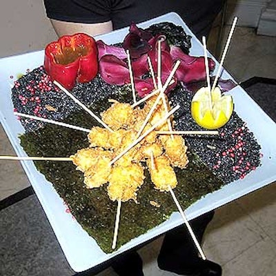 The coconut-crusted chicken came with honey soy dipping sauce in a hollowed out pepper.